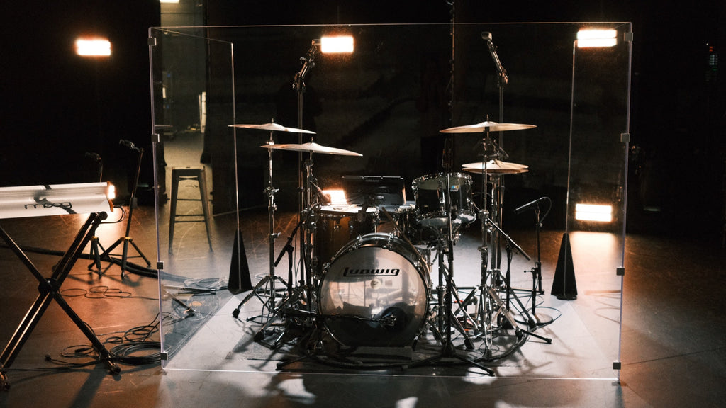 Pure Shields drum shield on a church stage