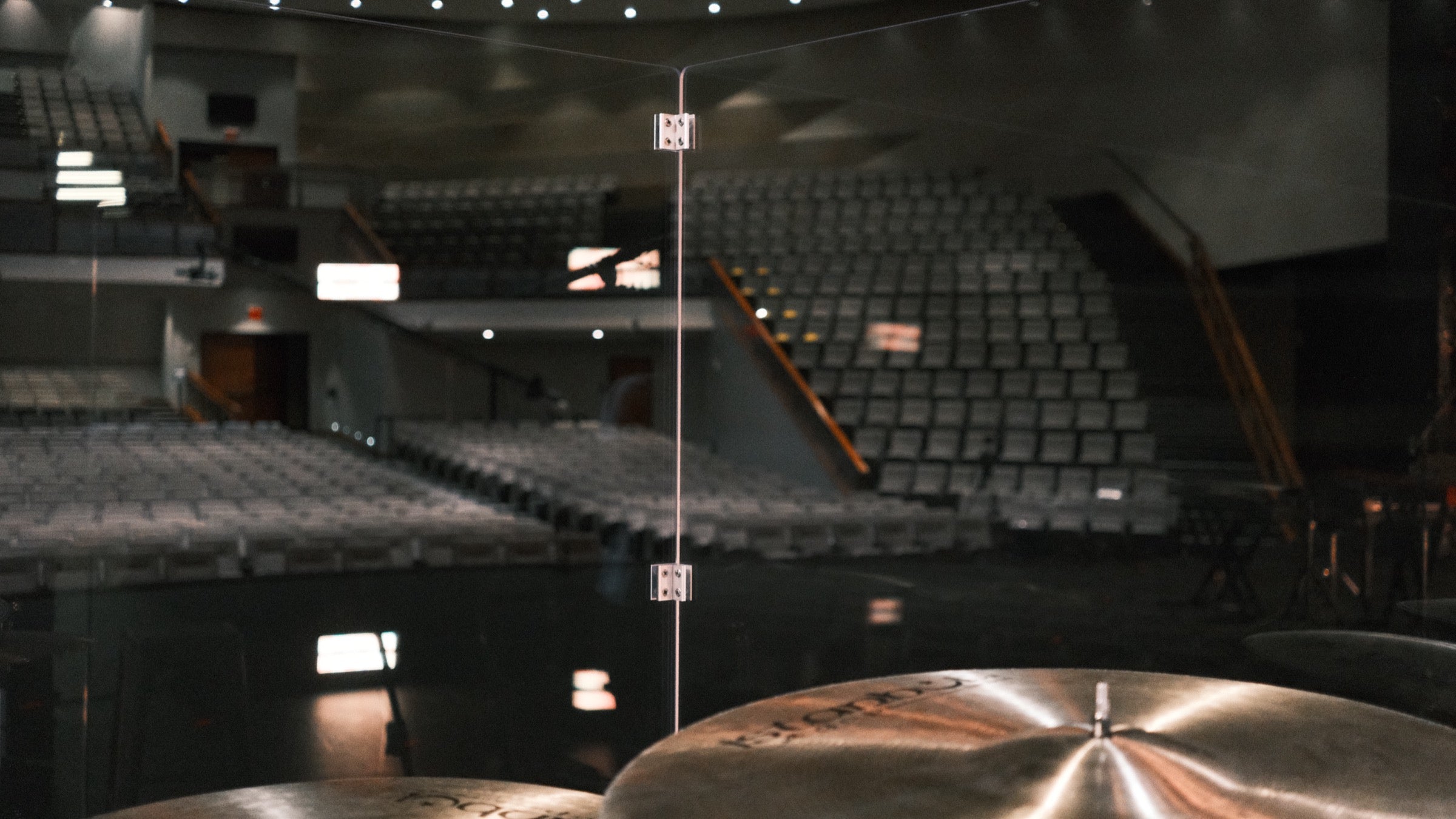 Pure Shields drum shield on a church stage